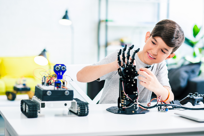High-achieving student working on a robotics module in an advanced enrichment session.