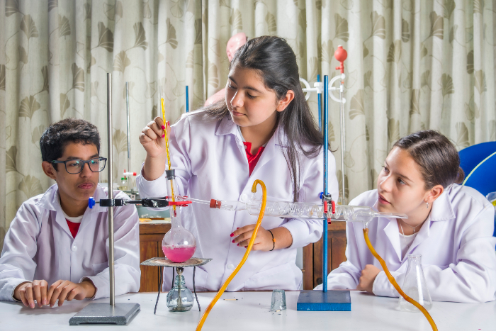 Students engaging in a hands-on experiment in the Innovation Lab