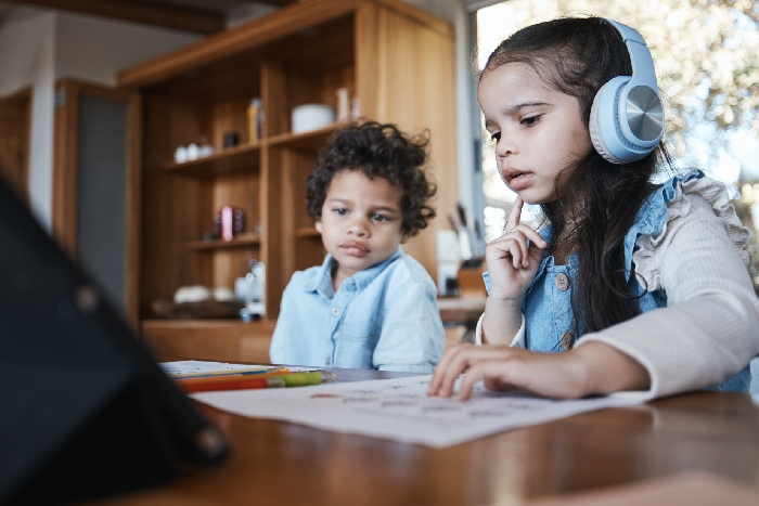 Students practicing pronunciation and listening skills in the Wordsworth lab at VPLS Seoni