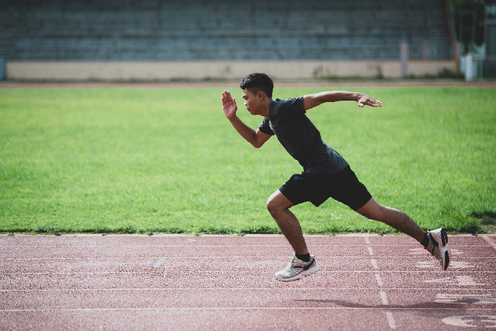Students running comfortably on a professional-grade athletics track during a sports session at VPLS Seoni.